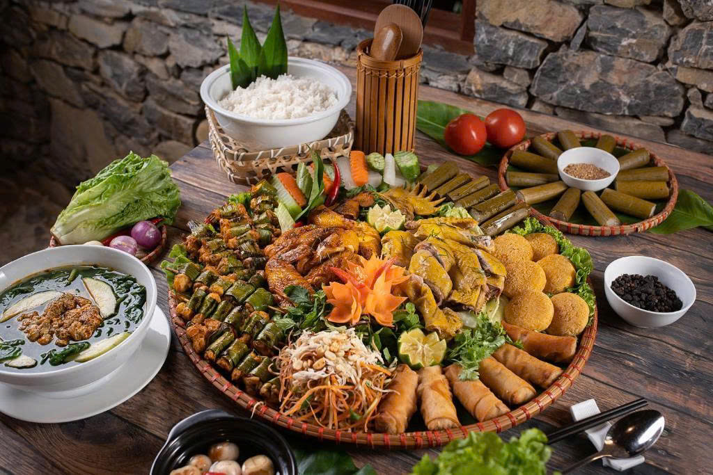 Authentic local family-style meal served with fresh regional ingredients Authentic local family-style meal served with fresh regional ingredients