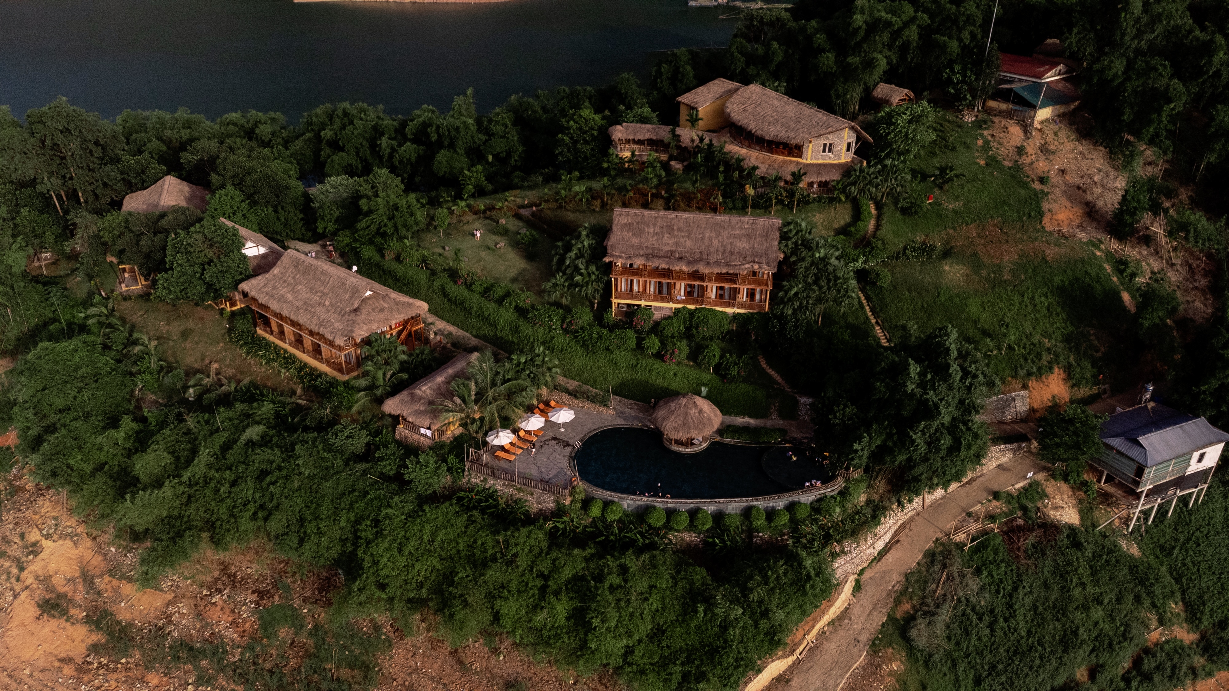 Aerial or waterline shot of Mai Chau Hideaway's peninsula setting Aerial or waterline shot of Mai Chau Hideaway's peninsula setting
