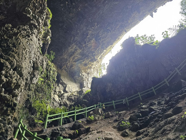 Muong Village sits in a valley surrounded by limestone mountains and rice terraces Muong Village sits in a valley surrounded by limestone mountains and rice terraces
