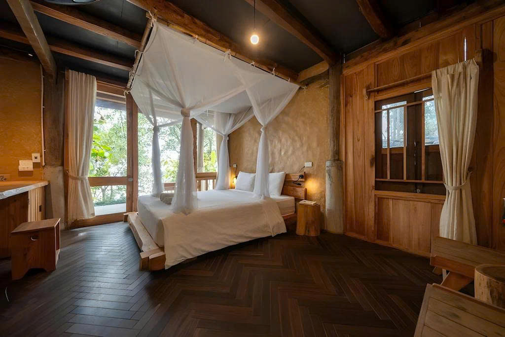 Phòng bungalow tại Xoan Retreat với nội thất gỗ tự nhiên Phòng bungalow tại Xoan Retreat với nội thất gỗ tự nhiên