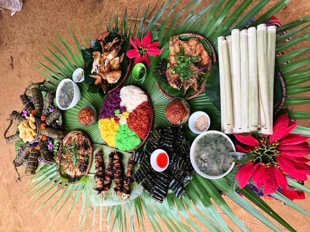 Grilled chicken, stream fish, and sticky rice laid out for lunch (Source: Collected)